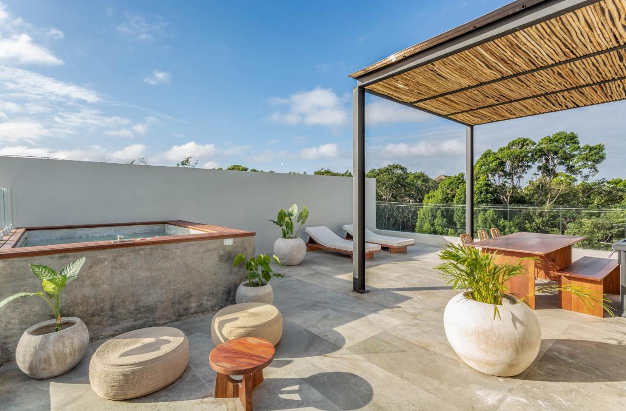 Xperience Tulum Hotel Exterior photo Rooftop at the hotel