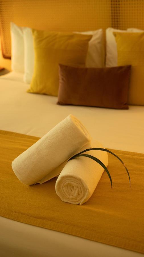 Xperience Tulum Hotel Exterior photo A rolled up towel