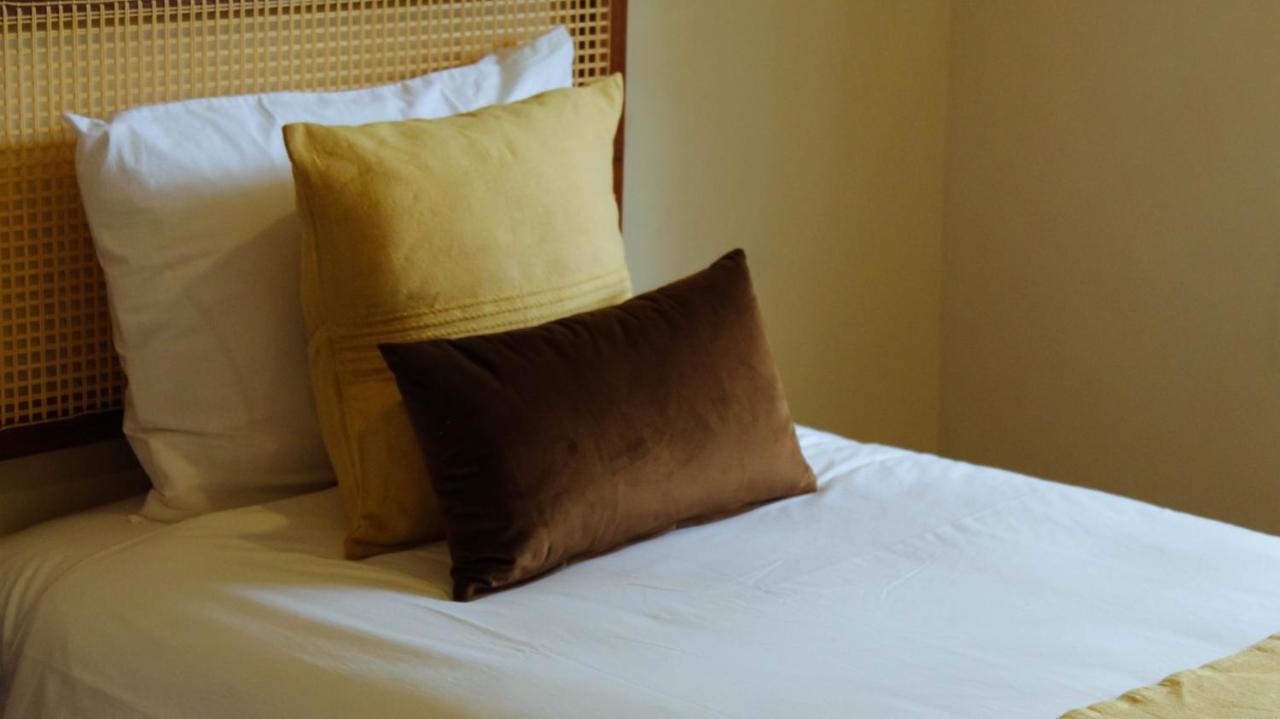 Xperience Tulum Hotel Exterior photo A bed with cushions