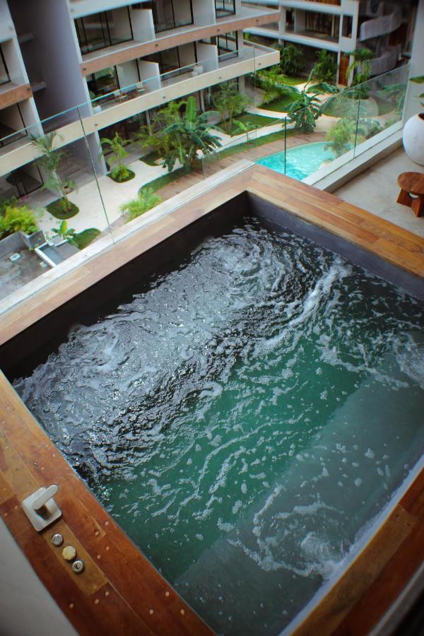 Xperience Tulum Hotel Exterior photo A whirlpool bathtub